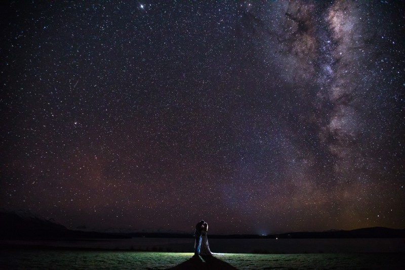 wedding couple under the stars at mt cook lakeside retreat
